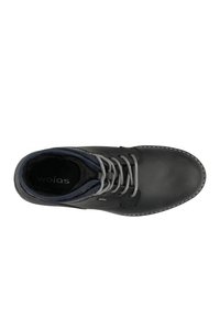 Black leather shoe with gray laces, padded collar, and blue lining. Features a rounded toe and contrasting stitching along the sole.