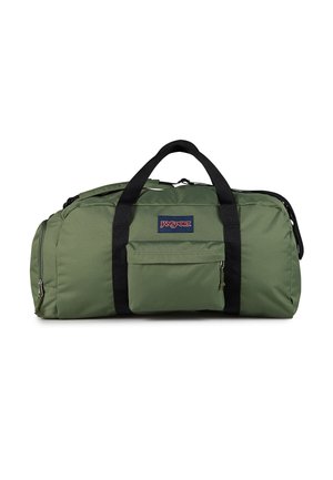 Zielona torba sportowa Jansport z czarnymi uchwytami, przednią kieszenią na zamek i boczną kieszenią na zamek, przedstawiona na białym tle.