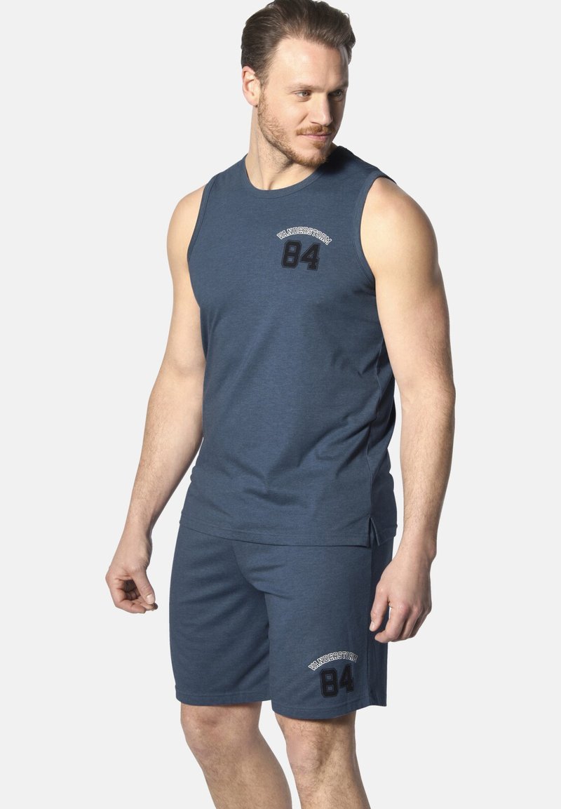 Men's sportswear set in navy blue. Features a sleeveless top with a round neckline and shorts, both with printed accents and a soft texture.