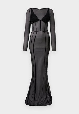 Black long-sleeve dress featuring sheer mesh fabric with a fitted silhouette and structured bodice, accented by vertical lines and a mermaid hem.
