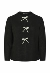 Svart stickad tröja med rund hals, prydd med tre vita pärlbelagda rosetter som detaljer och ribbade muddars vid ärmarna.