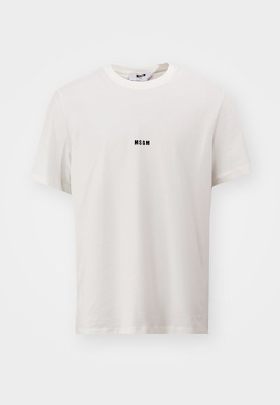Hvit bomulls t-skjorte med rund hals. Har en liten svart "MSGM"-logo sentrert på brystet. Korte ermer, avslappet passform.