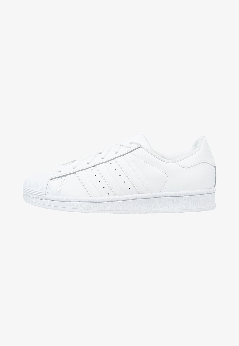 White leather sneaker with a rubber sole, featuring three side stripes, perforated detailing, and a classic shell toe design.