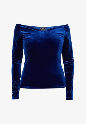 Fluwelen off-the-shoulder top in diepblauw. Lange mouwen met een aansluitende pasvorm. Heeft een V-vormige halslijn en een soepele textuur.