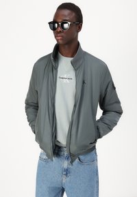 Calvin Klein Jeans PADDED HARRINGTON - Giacca da mezza stagione - endless grey