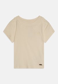 Maglietta beige a maniche corte, in tessuto a costine, con ricami floreali sulle spalle e un piccolo etichetta del brand sull'orlo. Tessuto morbido.