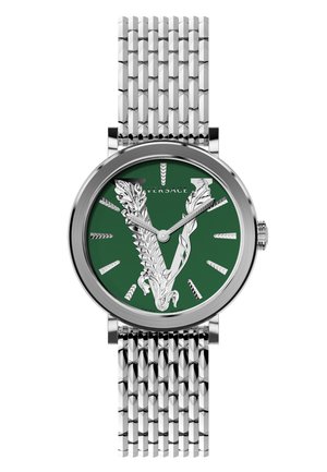 Silver metal wristwatch with a green dial, featuring a prominent engraved ‘V’ design, and a textured metal mesh strap.