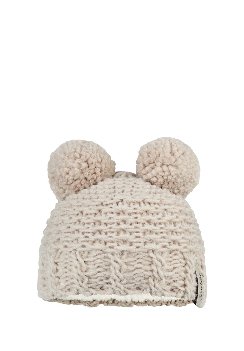 Knit winter hat in light beige with two pom-poms on top, featuring a textured cable pattern and a contrasting cream-colored trim.