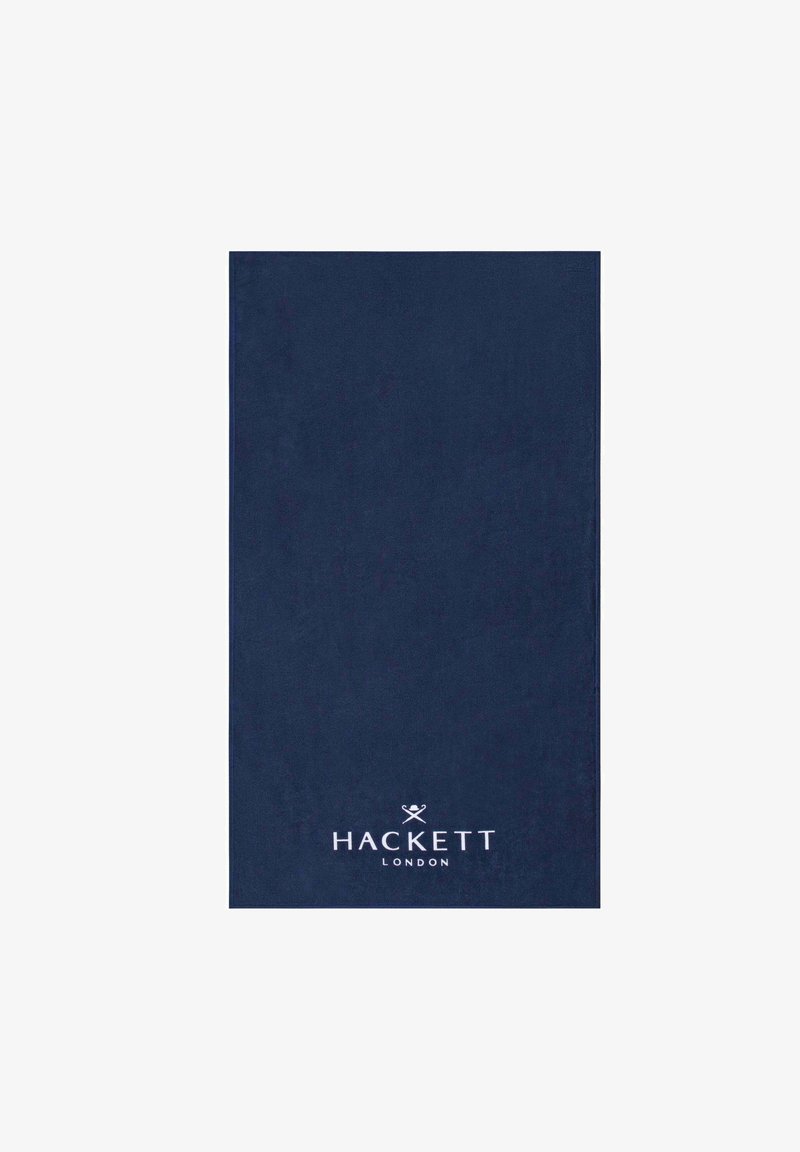 Navyblaue Baumwollhandtuch mit glatter Textur und weißem "HACKETT LONDON" Logo am unteren Rand, rechteckige Form ohne Muster.
