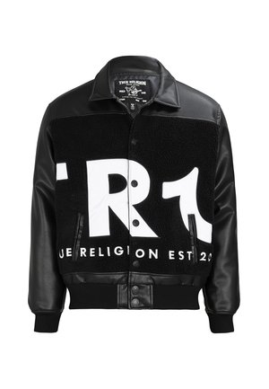 Schwarz-weiße True Religion Jacke mit Ledärmeln, Knopfleiste vorne und großem, fettem Logotext über Brust und Oberkörper.