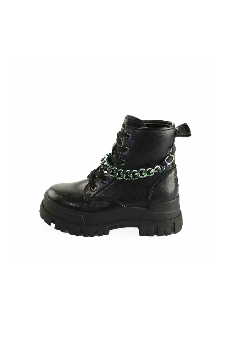 Black leather ankle boot with a chunky rubber sole, featuring colorful eyelets and a chain detail wrapped around the ankle.