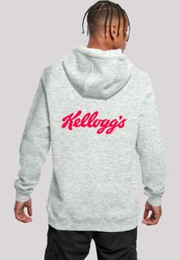 Gray hoodie with a front pocket and drawstring hood. Features a large red "Kellogg's" logo on the back. Made from soft fabric with ribbed cuffs.