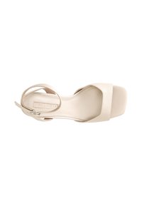 Sandalie cu toc înalt bej, cu vârful deschis, formă pătrată și o curea subțire pentru glezna piciorului. Material din piele netedă, cu un design minimalist.