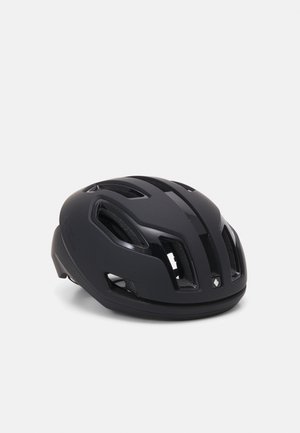 Capacete preto com um acabamento mate suave, apresentando múltiplos ventiladores e um design aerodinâmico e fluido para ventilação e aerodinâmica.