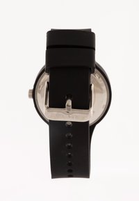 Black silicone watch strap with a metal buckle, features a circular watch face with clear display and minimalistic design.