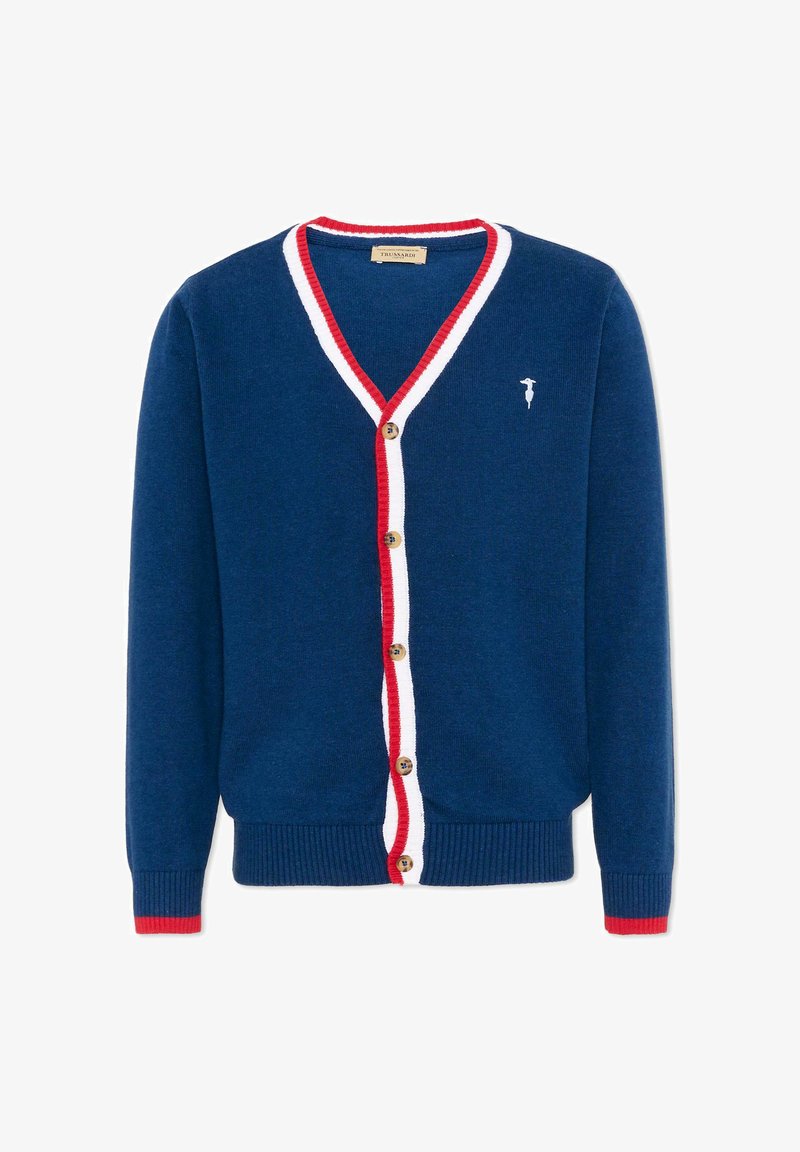 Cardigan bleu marine avec garniture rouge et blanche sur la ligne de boutons et le col, boutons en bois, poignets côtelés avec bordure rouge et petit logo blanc sur la poitrine.