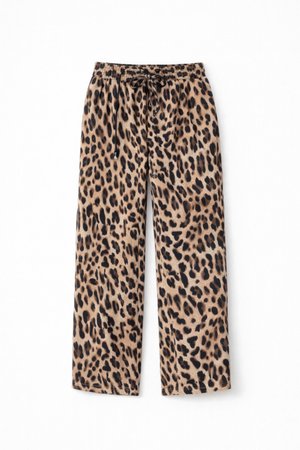 Wijde broek met luipaardprint, gemaakt van zacht stof. Heeft een elastische tailleband met een trekkoord. Kleuren zijn lichtbruin en zwart.