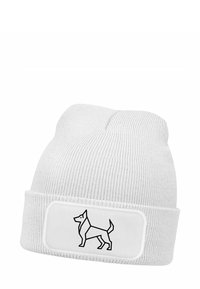 White knitted beanie with a folded cuff. Features a black outline of a dog on a rectangular patch on the front. Smooth texture.