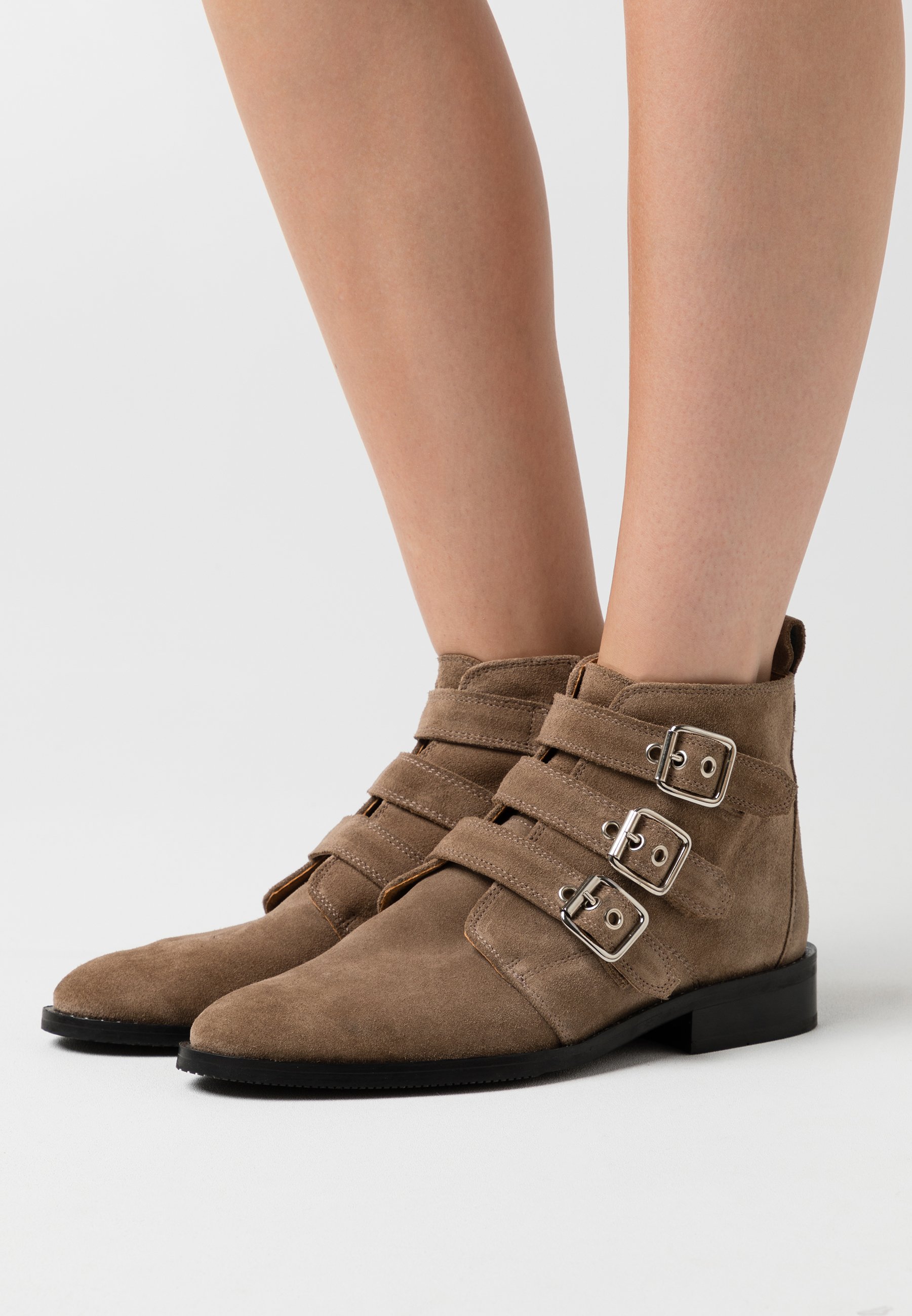 buckle ankle boots