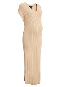 Robe en maille côtelée beige avec un col en V, des manches courtes et des fentes latérales, conçue pour s'adapter à un ventre en croissance. Texture douce et coupe ajustée.