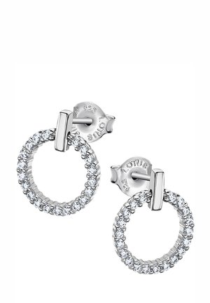 Boucles d'oreilles argentées présentant des designs circulaires ornés de petites pierres précieuses transparentes, maintenues par des fermoirs à tige pour un maintien sécurisé.