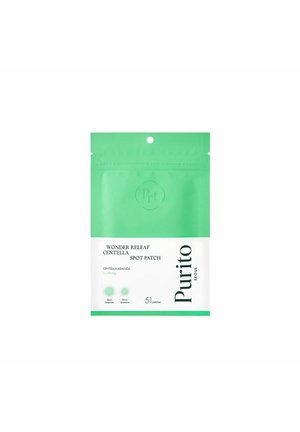 Purito Wonder Releaf Centella Spot Patch Pack mit 51 beruhigenden Pflastern in zwei Größen, grünem und weißem wiederverschließbarem Beutel.