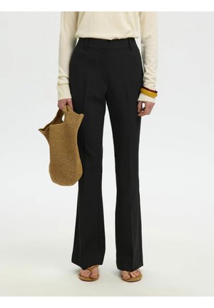 - Spodnie materiałowe