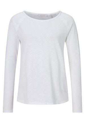 Cămașă albă cu mâneci lungi, cu un decolteu rotund, confecționată dintr-un material ușor, având o textură netedă și un design minimalist.