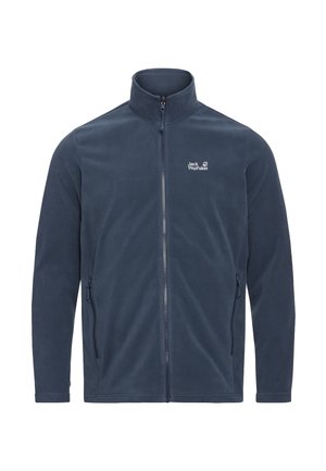 Giacca in pile blu navy con collo alto, cerniera frontale completa, tasche laterali e un piccolo logo bianco sul petto. Tessuto morbido.