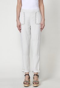 Nohavice - crudo off white