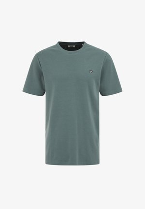 Maglietta a maniche corte con scollo tondo in verde tenue opaco, con un piccolo logo di un uccello ricamato sul petto a sinistra.