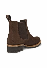 Braune Wildleder-Ankelstiefel mit elastischen Seitenteilen, Zuglasche, runder Spitze und einer strukturierten Gummisohle. Verfügt über kontrastierende Stichakzente.