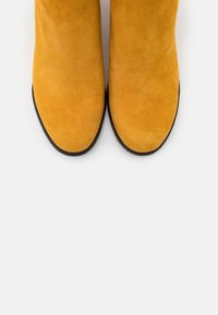 s.Oliver BLACK LABEL Ankle boots - saffron