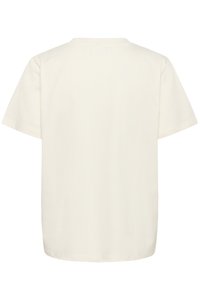 Camiseta de algodón color crema con corte recto, mangas cortas y escote redondo. Sin patrones ni accesorios visibles.