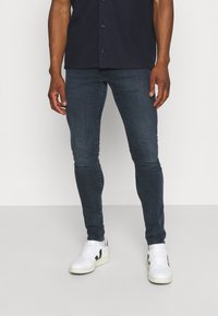 Levi's® SKINNY TAPER - Calças de ganga de corte skinny - ocean pewter