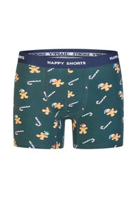 Groene boxershorts met een print van koekjes en zuurstokken. Heeft een marineblauwe tailleband met de tekst "HAPPY SHORTS". Gladde textuur.