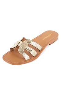 Gold metallic slide sandal with three narrow straps, smooth leather insole, and a tan flat sole. Features a branded logo detail.
