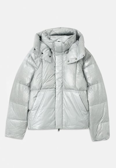 Silver puffer jacket with a high collar, featuring a quilted design, snap buttons, and a slightly shiny texture. Zippered front.