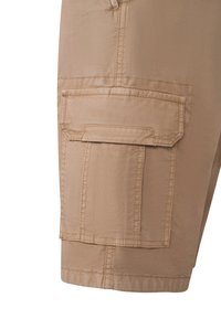 Beige cargo shorts featuring two side pockets, stitched detailing, and a straight cut, made from lightweight, smooth fabric.