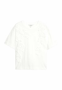 Vit t-shirt med kort ärm som har ett strukturerat blommigt applikation på ena sidan. Bekvämt bomullsmaterial med avslappnad passform.