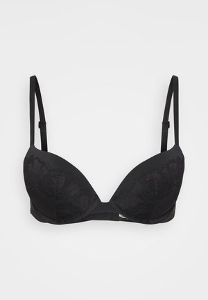 Soutien-gorge rembourré noir avec des détails en dentelle sur les bonnets, des bretelles réglables et une base en tissu lisse. Présente une forme élégante et ajustée.