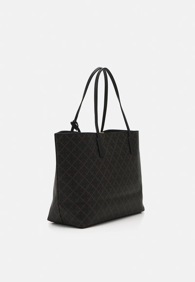 Black tote bag with a textured finish, featuring a diamond pattern in a darker tone, two long handles, and a spacious silhouette.