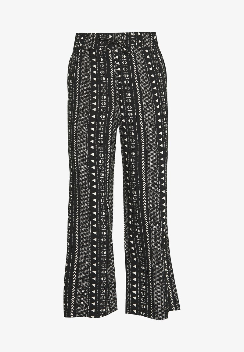 Pantalon large noir avec des motifs géométriques blancs verticaux inspirés des tribus et une taille à cordon.