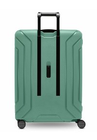Valigia rigida di colore verde menta con una finitura testurizzata, manico verticale nero e quattro ruote nere per la mobilità.