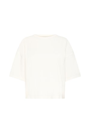 T-shirt blanc surdimensionné à manches courtes avec un col rond et des coutures d'épaule abaissées sur un fond uni.