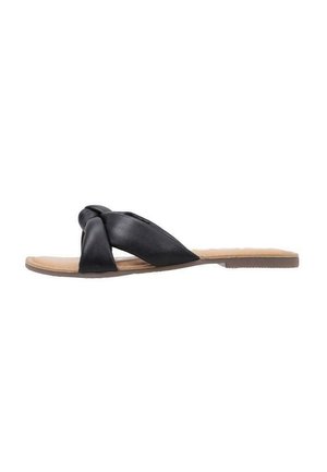 Sandale à semelle plate en cuir noir avec un design de bride nouée et une semelle beige texturée. Convient pour un usage décontracté.