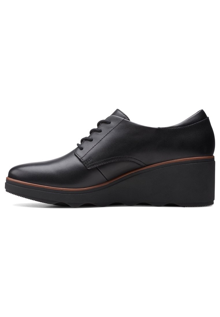 Clarks Bottines compensées - black