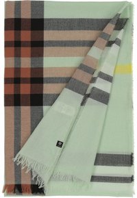 Bufanda de cuadros tejida en verde menta, con franjas en marrón, negro y gris, con bordes desflecados y una pequeña etiqueta de logo. Tejido ligero.