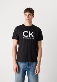 Calvin Klein Jeans GRAPHIC TEE - T-shirt print - black