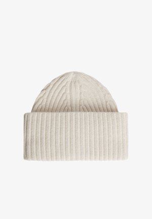 Light beige knitted beanie hat with a ribbed design and cable pattern. Features a folded cuff and soft texture. Suitable for cold weather.
